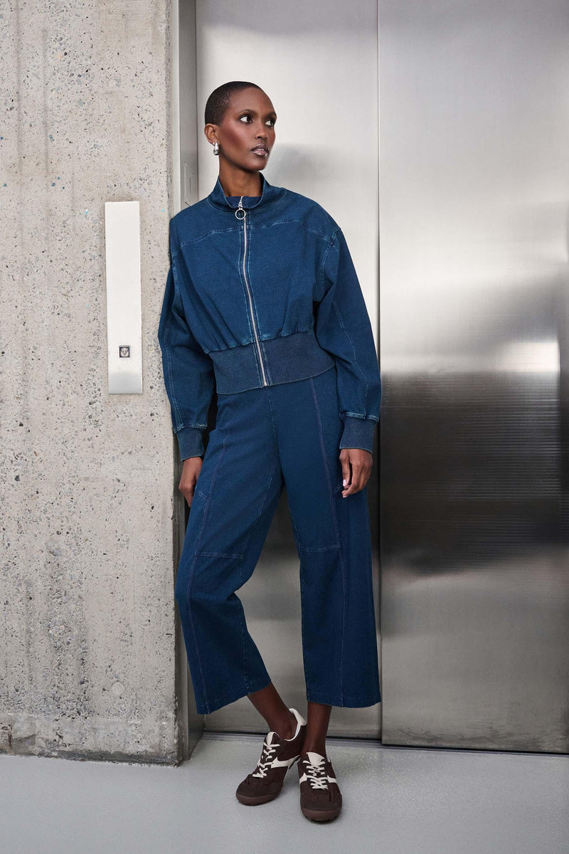 Overall in Denimblau mit Reißverschluss und weit geschnittenem Bein